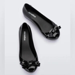 MINI MELISSA
Ultragirl Bow girls size 1
New never worn